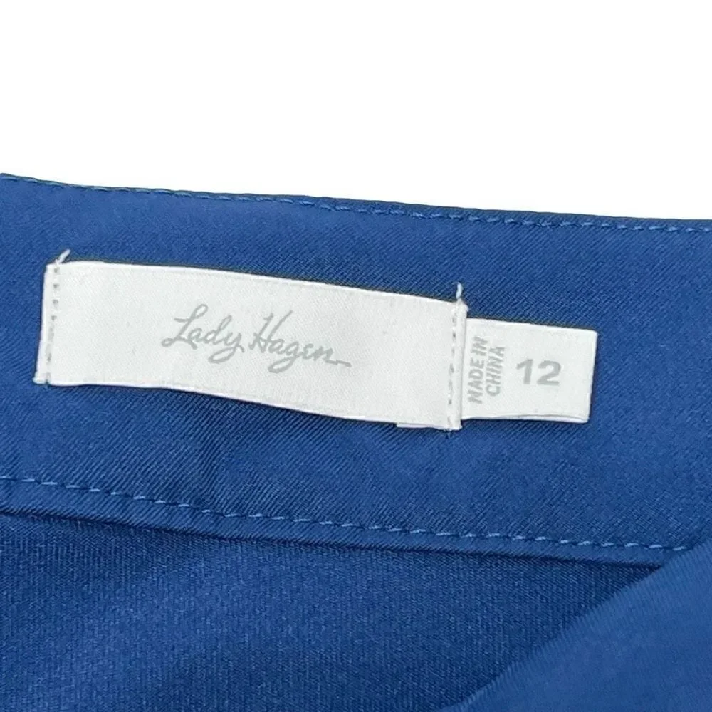 Lady Hagen blue zip front golf skort size 12.
